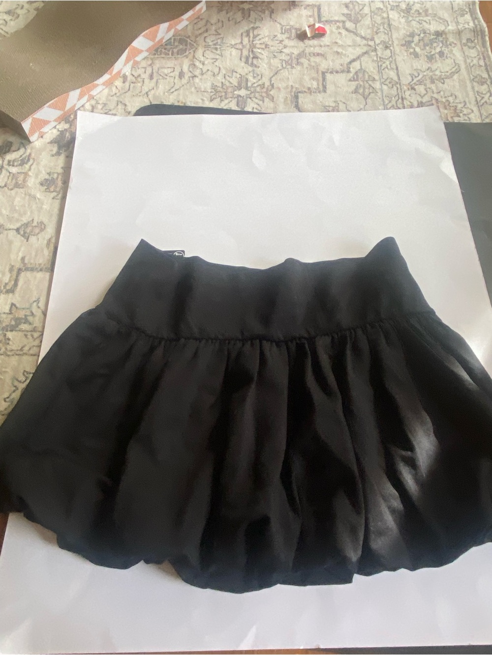 Black Women's Mini Skirt - Soft Flared Design considered balloon style